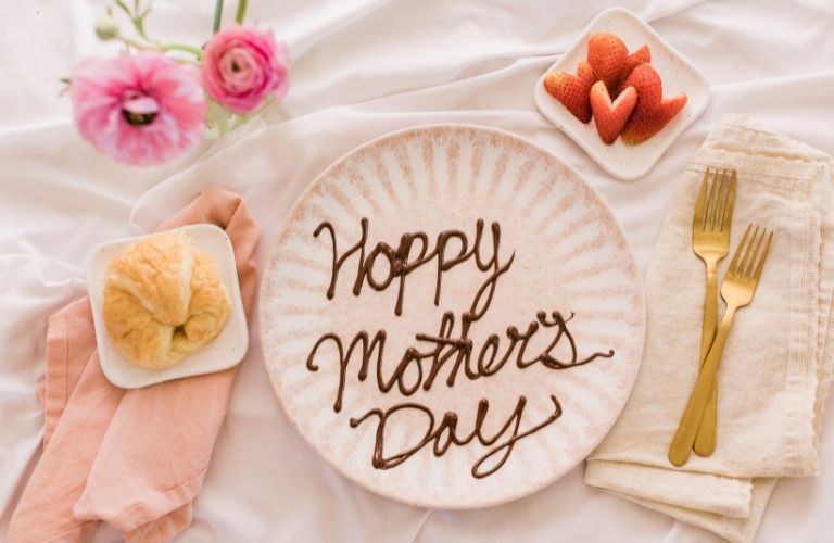 Syrup Spelling Out Happy Mother's Day on a Plate