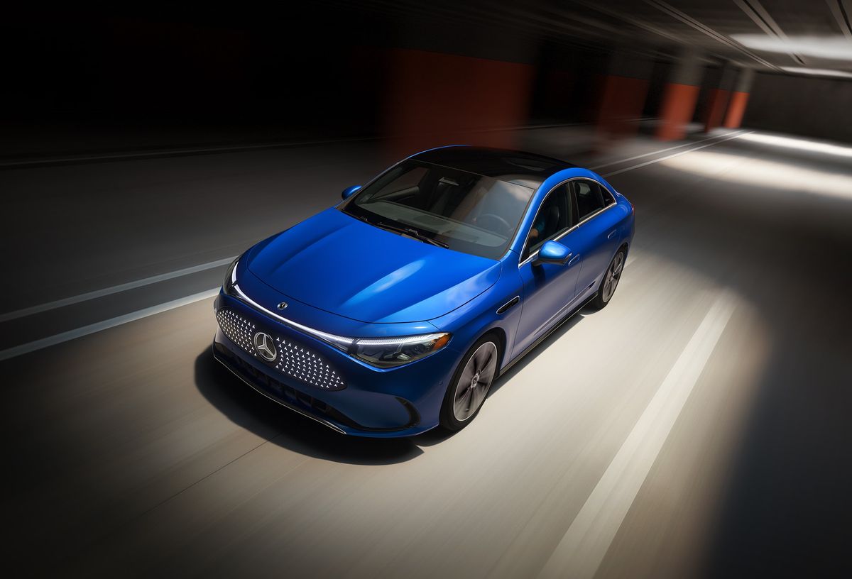 2026 Mercedes-Benz CLA all-electric sedan, front three-quarter driving shot