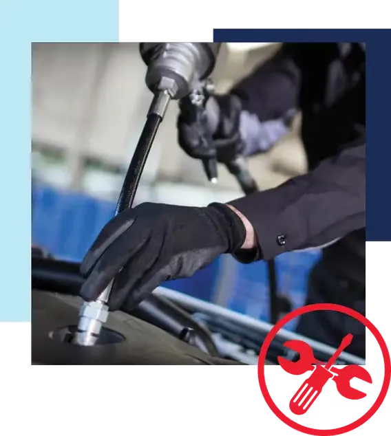 Elbow grease for us, not you. Automotive service technician topping off vehicle fluids. Red icon in lower-right corner of crossed wrench and screwdriver.