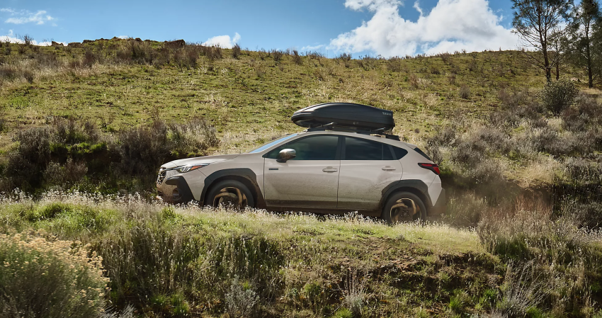 2026 Subaru Crosstrek Limited Hybrid Shown in Sand Dune Pearl with Accessory Equipment