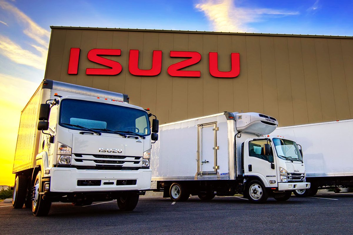 Isuzu Commercial Trucks in Front of Building