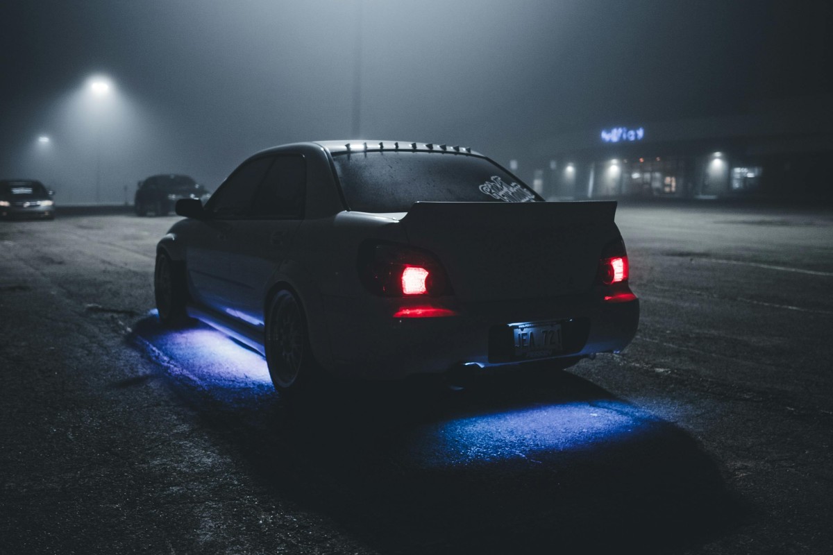 Custom Sports Car with Underglow Exterior Driver Side Rear Angle