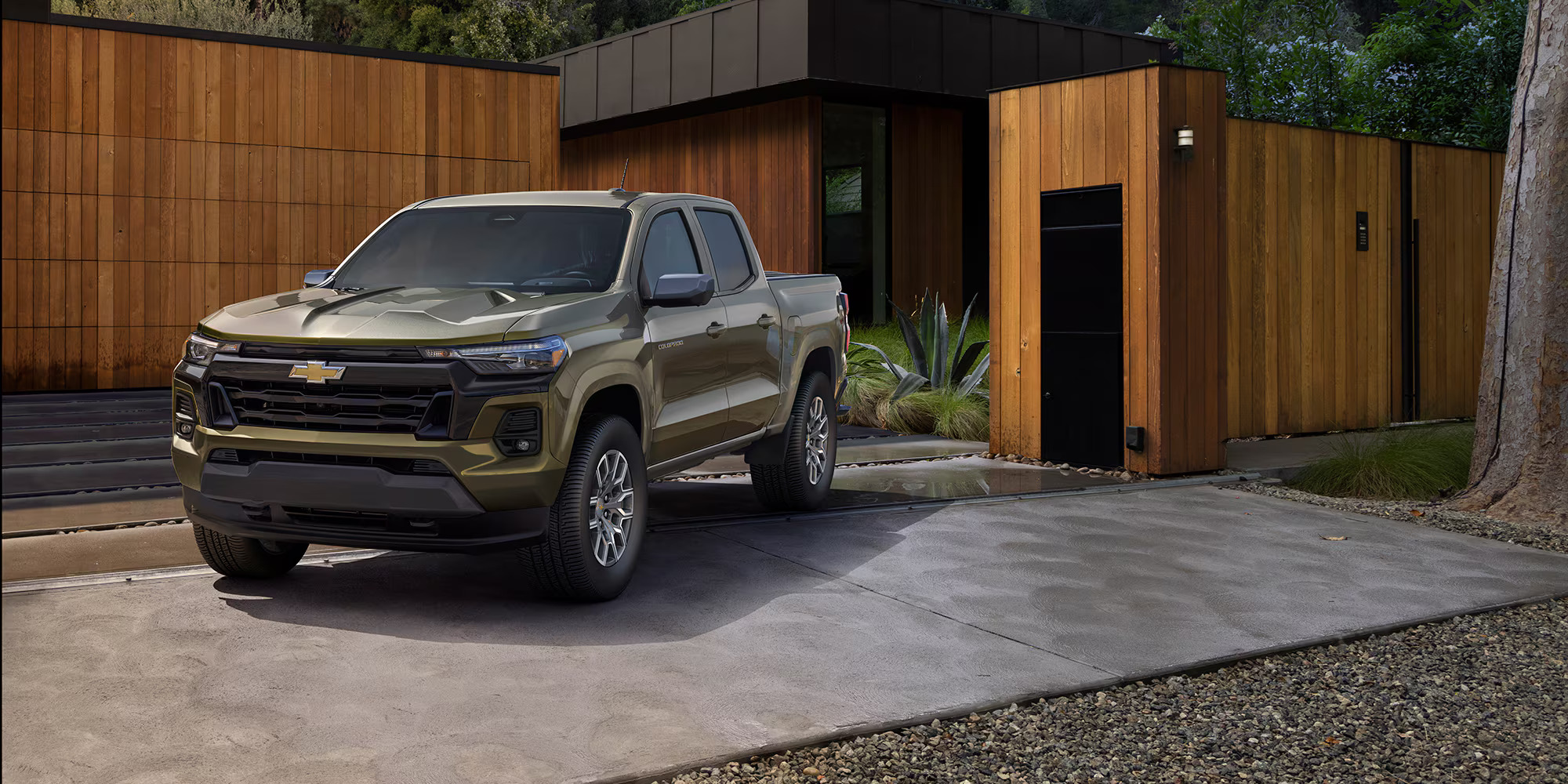 A green truck sitting parked.