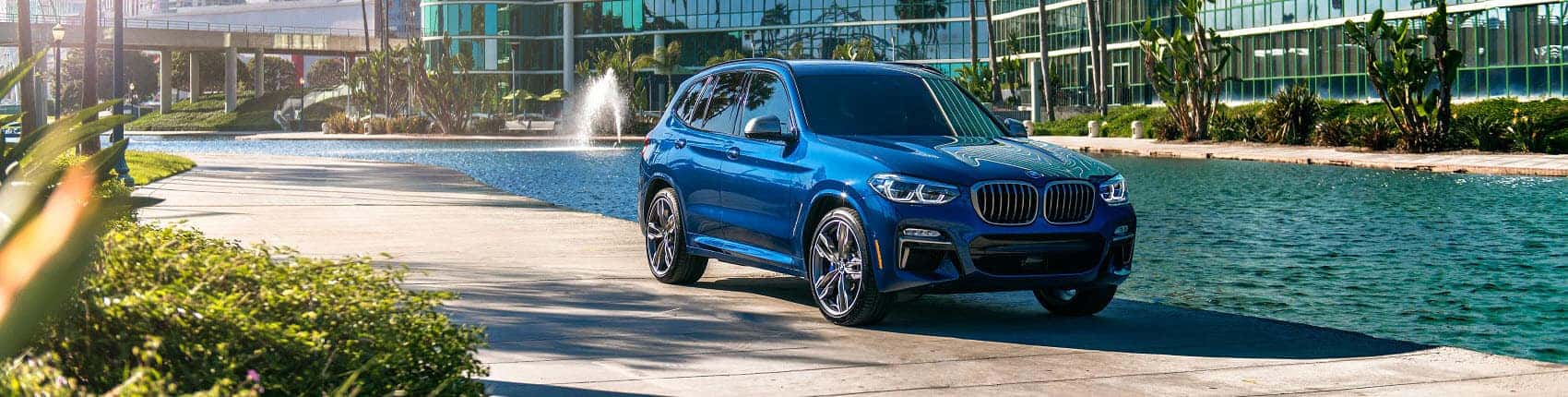 BMW X3 in blue showcasing its luxury and power