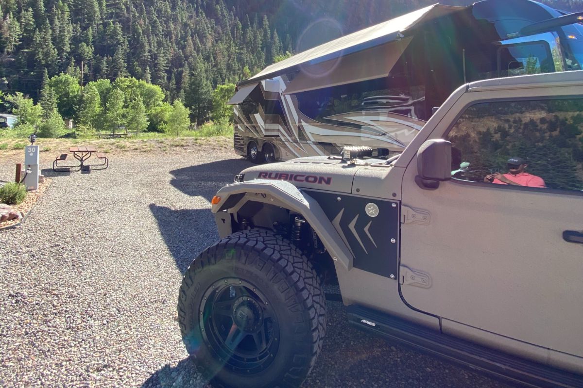 Jeep Wrangler Next to Motorhome