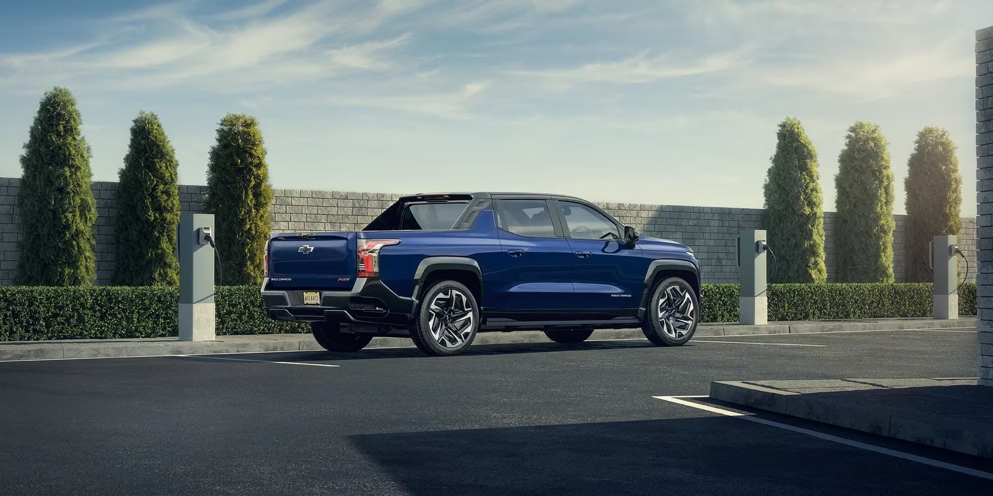 blue silverado EV parked in a parking lot