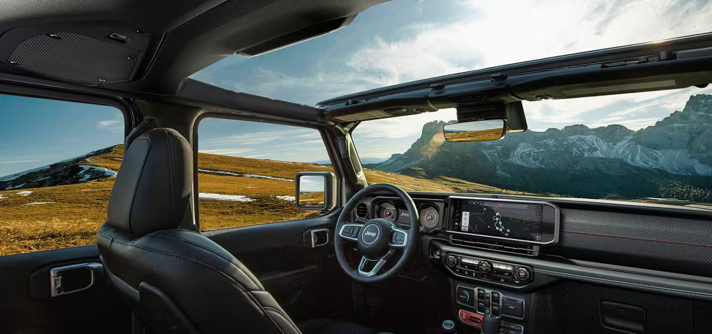 The front interior of a jeep.