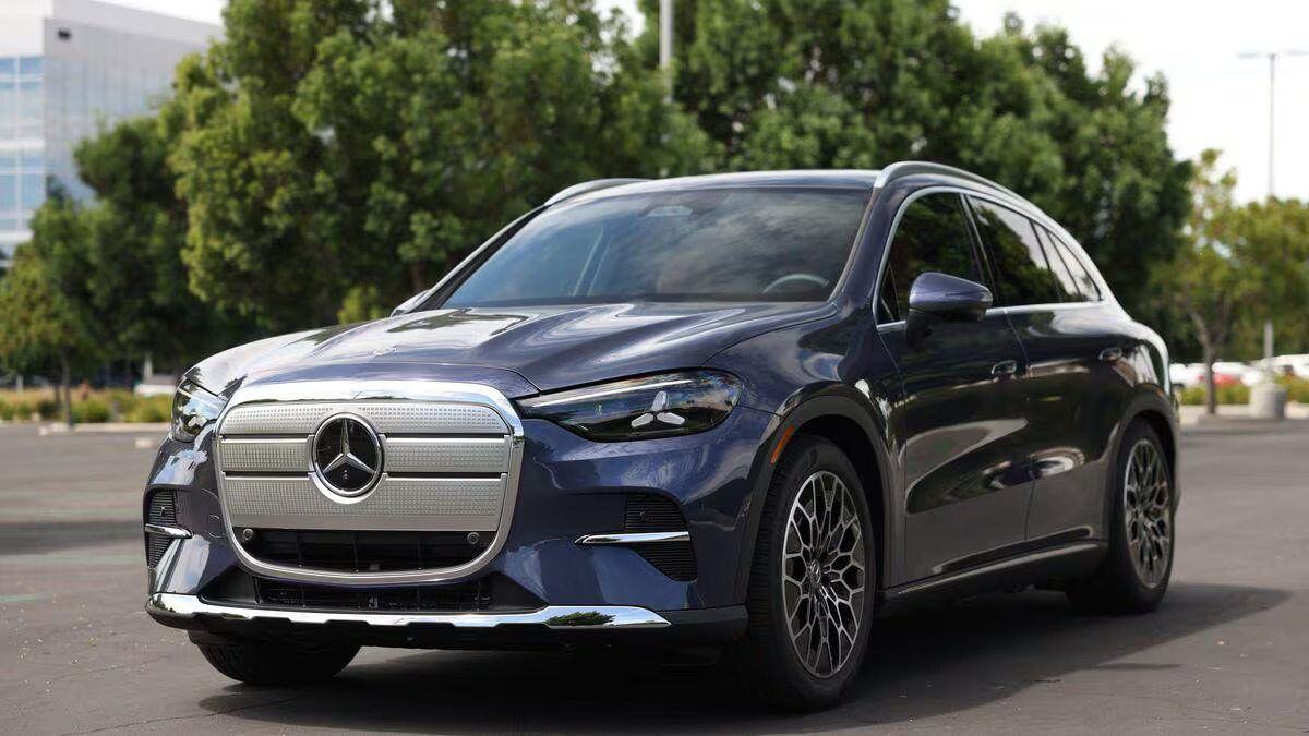 2027 Mercedes-Benz GLC EV in dark blue, front three-quarter view