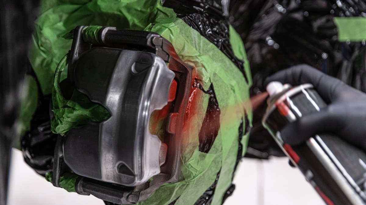 Brake Caliper Taped Off and Being Painted
