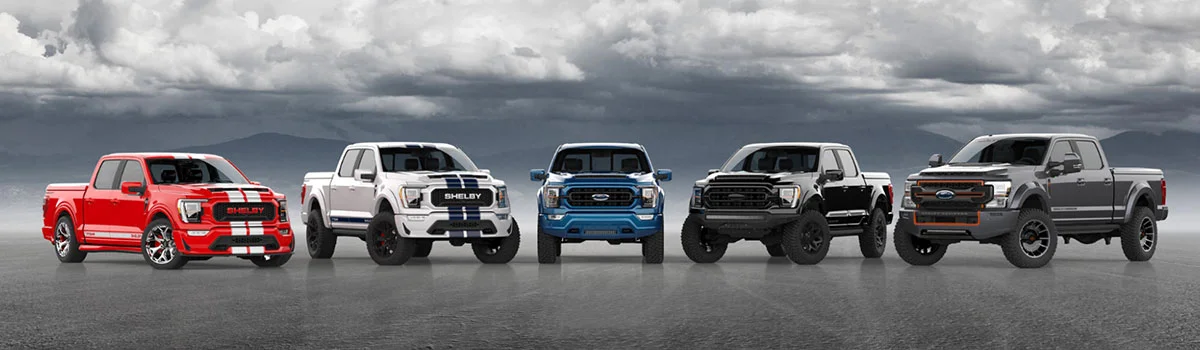 image of five ford trucks lined up