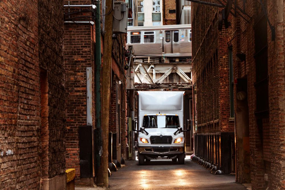 White International MV in alley 