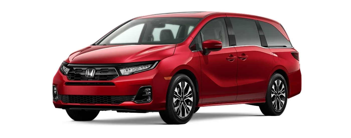 Red 2026 Honda Odyssey Elite angled left