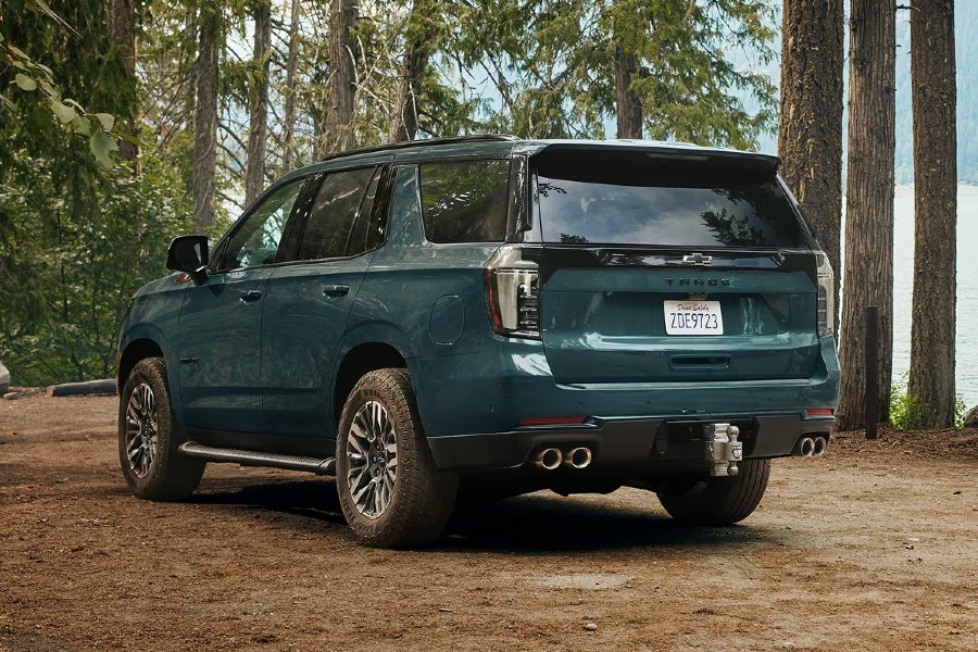 2026 Chevy Tahoe Exterior Driver Side Rear Angle in the Woods