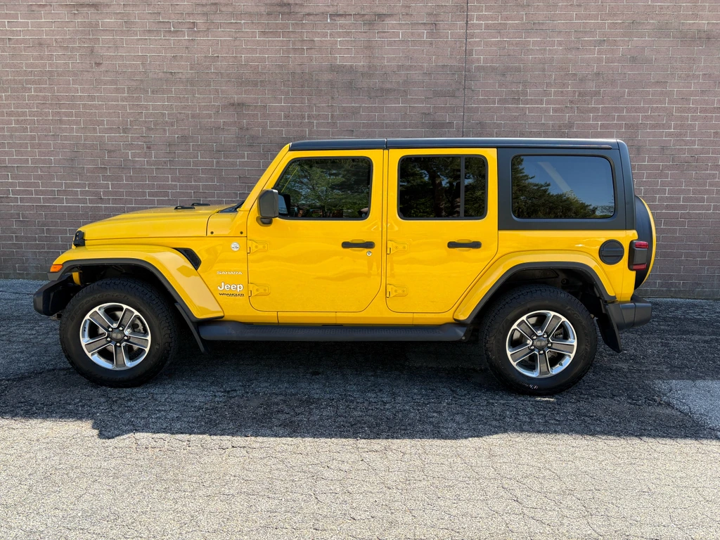 Used 2019 Jeep Wrangler Unlimited Sahara with VIN 1C4HJXEN8KW505166 for sale in Kansas City