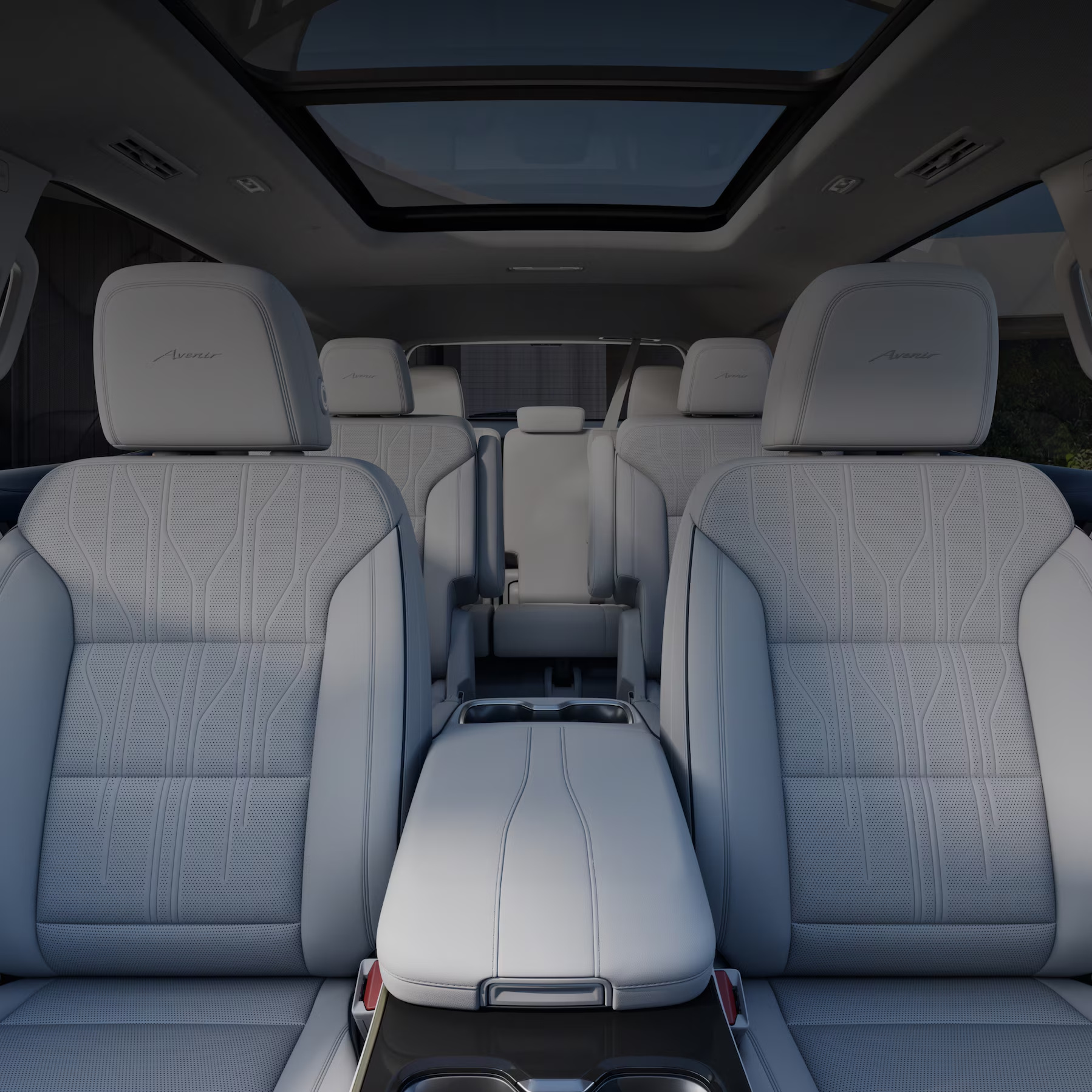 Buick Enclave Avenir interior with light gray seats and a panoramic sunroof