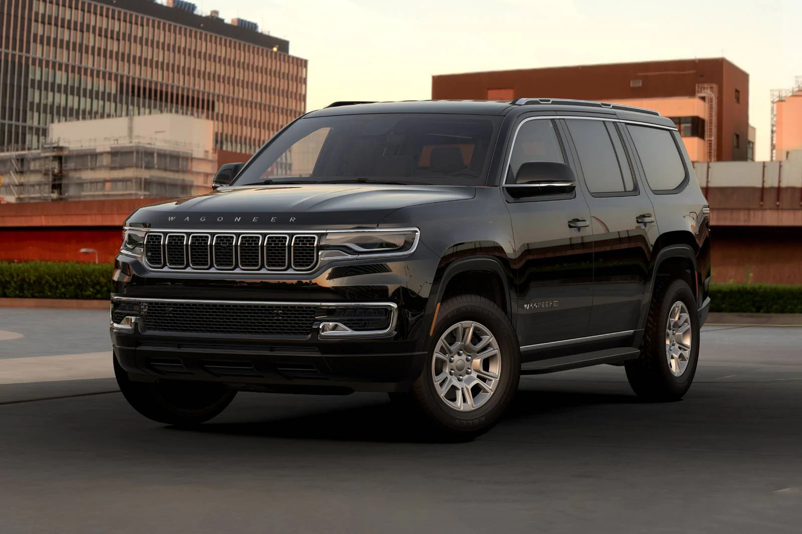 A black suv sitting parked.