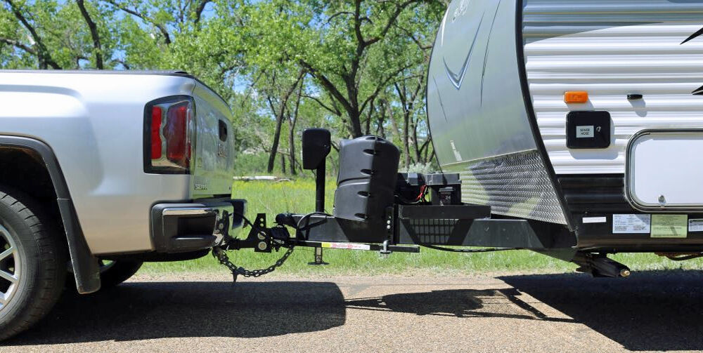 Camper trailer hitch connected to a truck ball hitch
