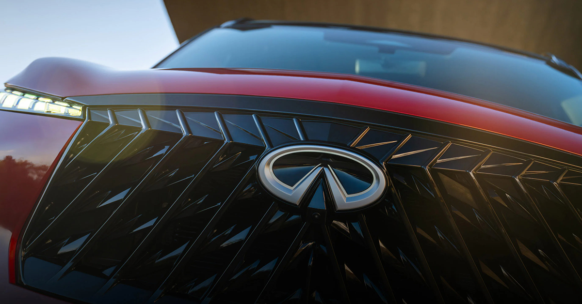 2026 INFINITI QX60 Green SUV Driving Road
