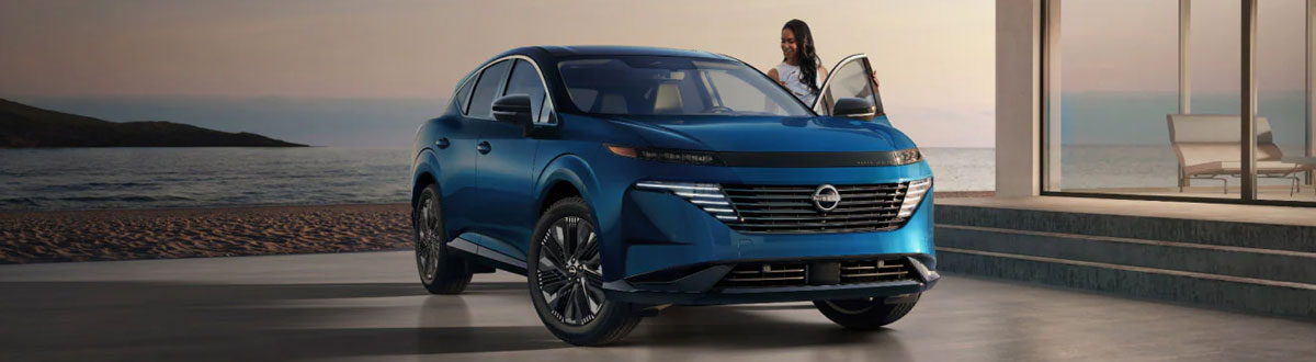 Blue 2026 Nissan Murano SUV Parked Next to Beach