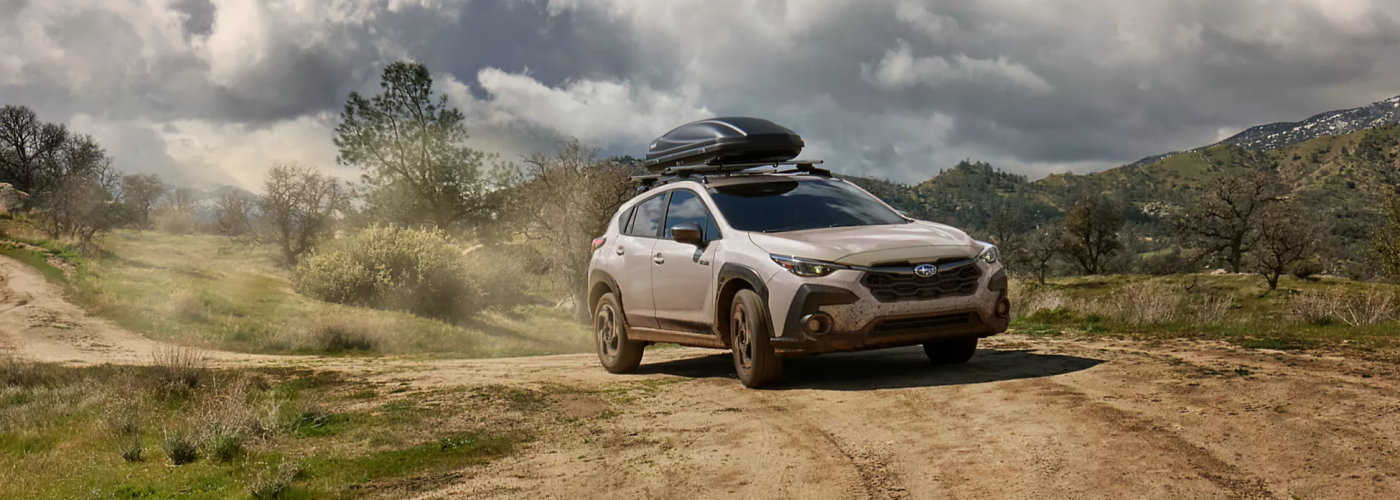 2026 Subaru Crosstrek Limited Hybrid Shown in Sand Dune Pearl with Accessory Equipment