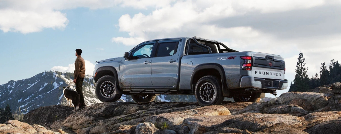 Silver 2025 Nissan Frontier PRO-4X parked at an overlook