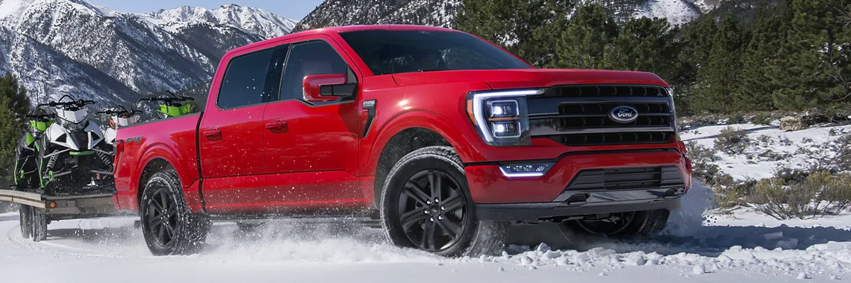Hero image showcasing vehicles in snowy conditions.