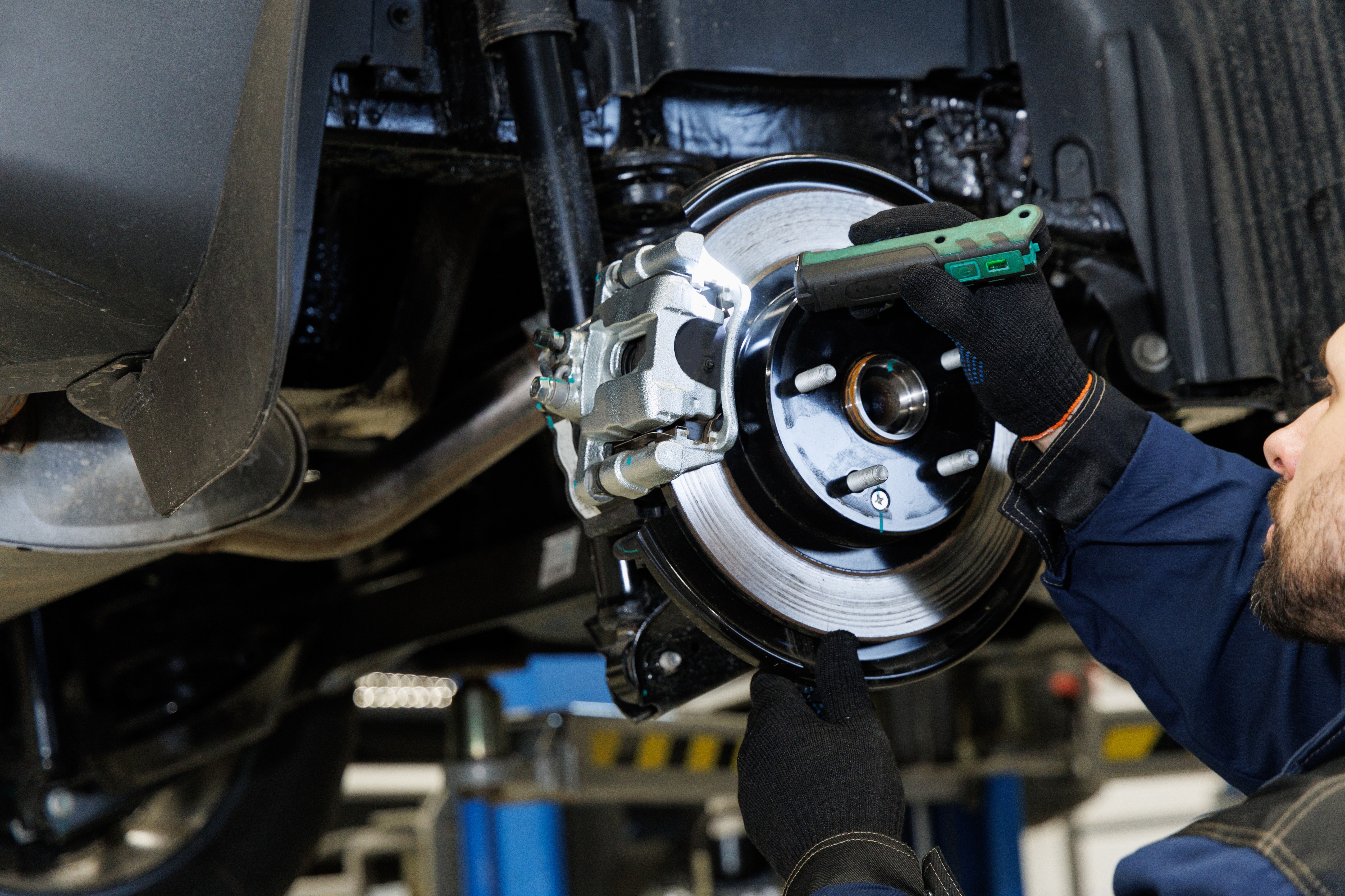 brake replacement being performed on a chevrolet car