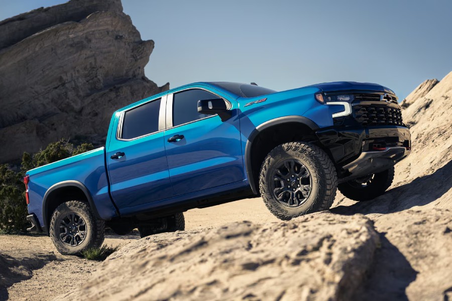 2026 Chevy Silverado 1500 Exterior Passenger Side Front Profile while Rock Crawling