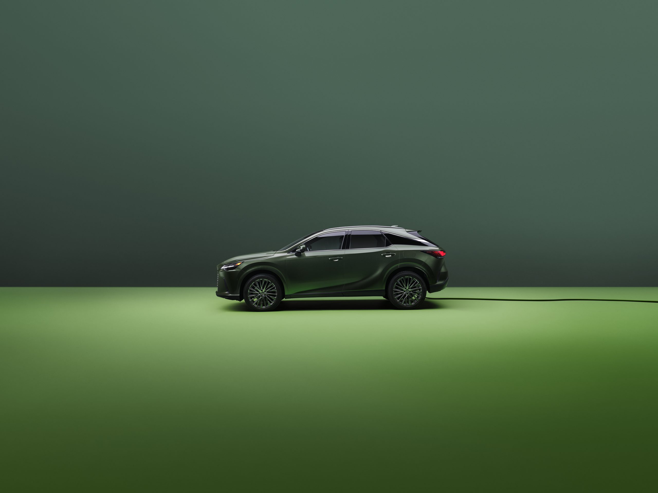 RX 450 Hybrid Plus Luxury all-wheel drive shown in Nori Green Pearl.