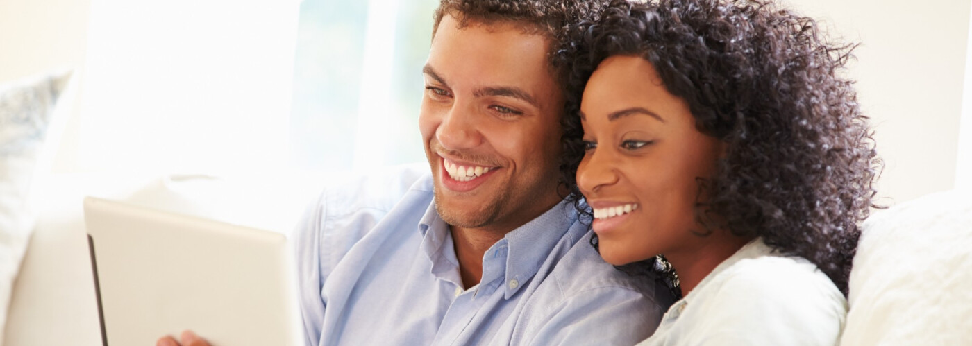 Couple Looking at Tablet