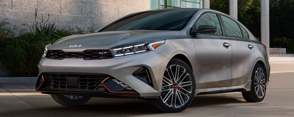 2023 Kia Forte Parked in Front of Building