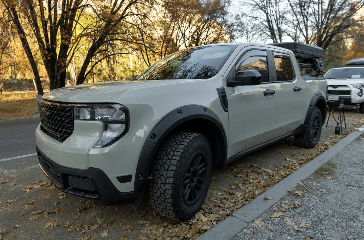 used SUV parked in autumn landscape