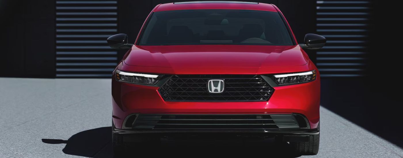 Front view of a red 2026 Honda Accord.