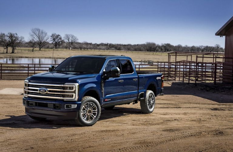 Blue 2025 Ford Super Duty Platinum Plus Front Exterior  on a Farm