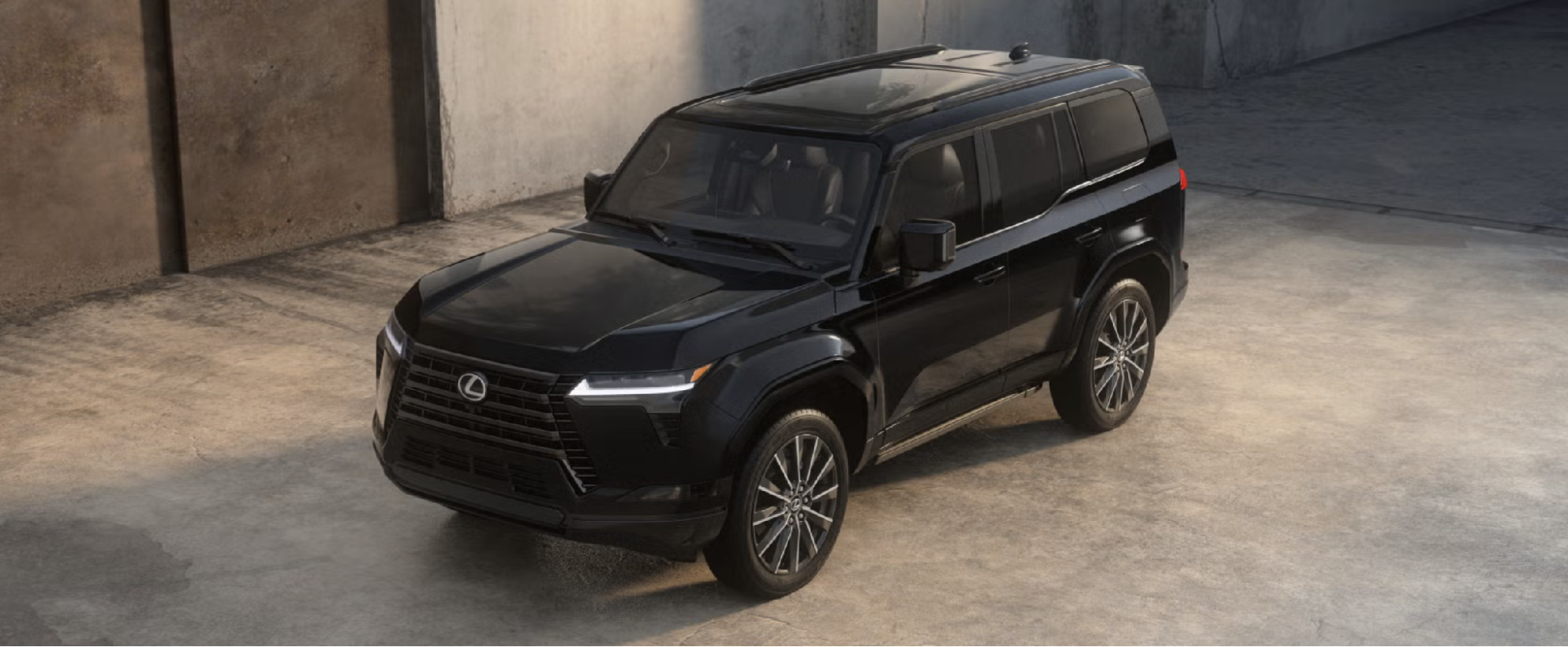Lexus SUV parked in a concrete garage, shown from a front three-quarter angle