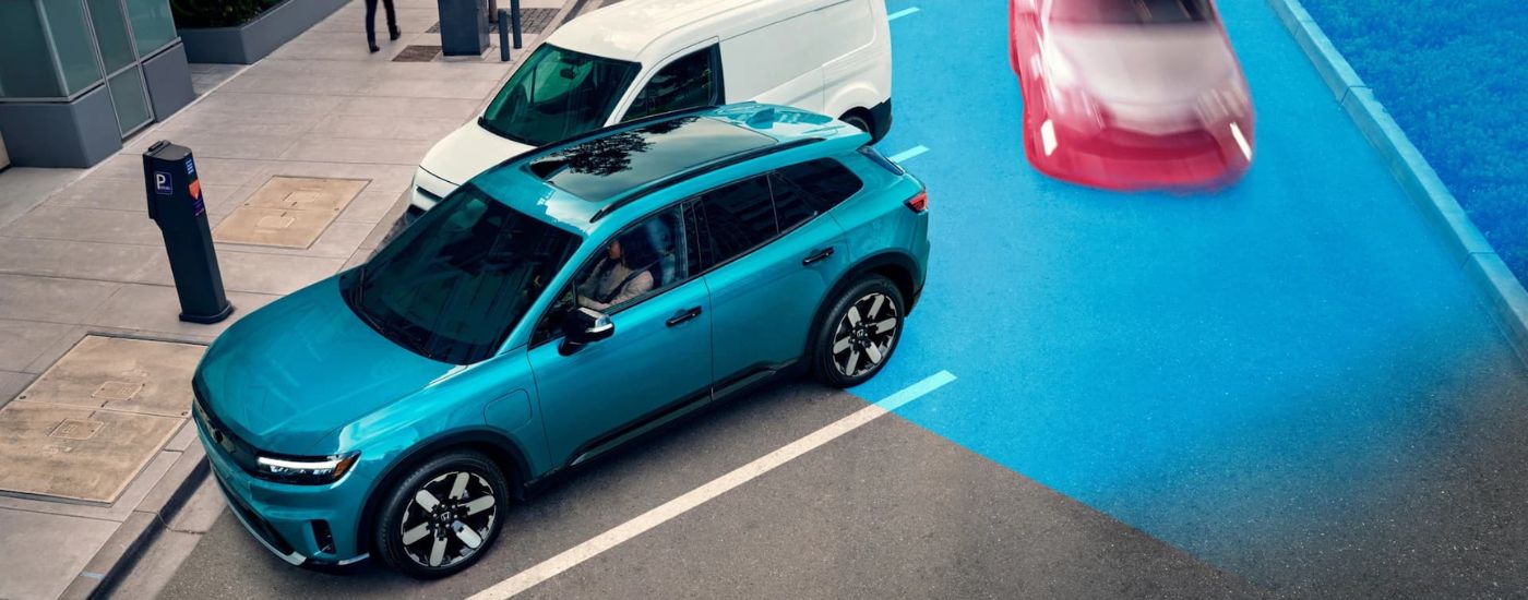 Simulated sensor lines coming from a teal 2024 Honda Prologue Elite