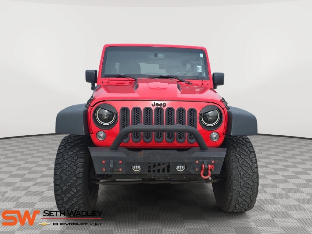 Used 2015 Jeep Wrangler Unlimited Sport with VIN 1C4BJWDG2FL551828 for sale in Perry, OK