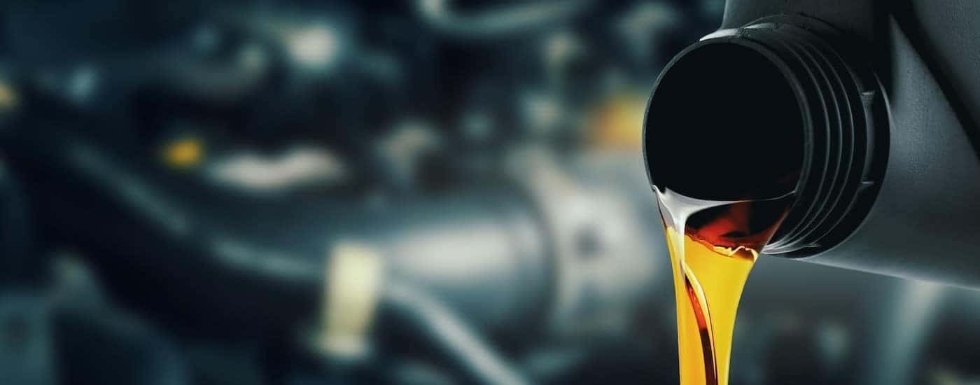 Oil is shown being poured from a container.