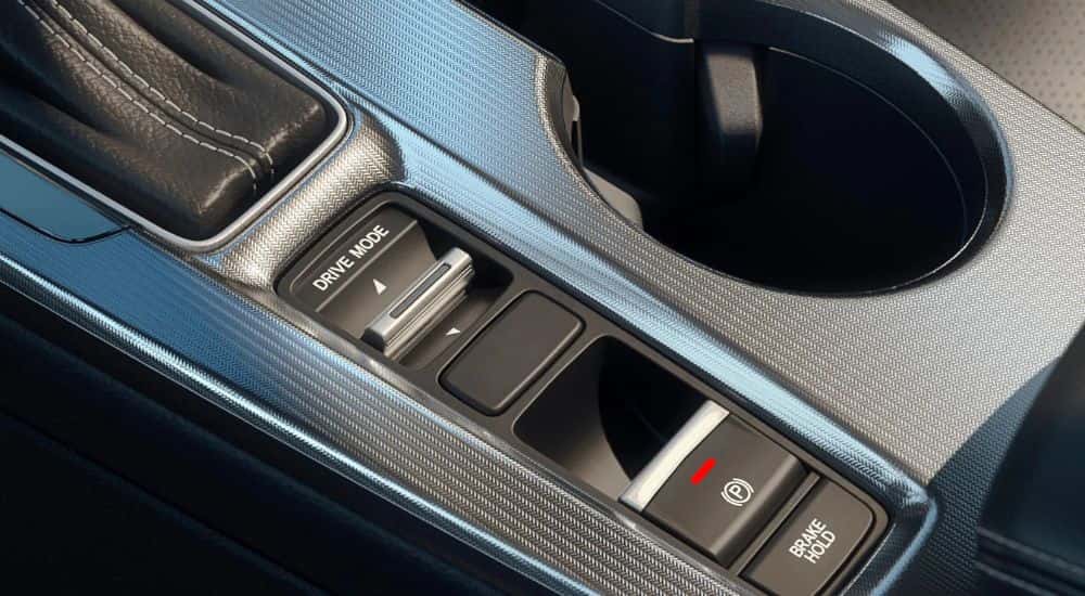 Close-up of the drive mode selector in a 2025 Honda Civic Hybrid.