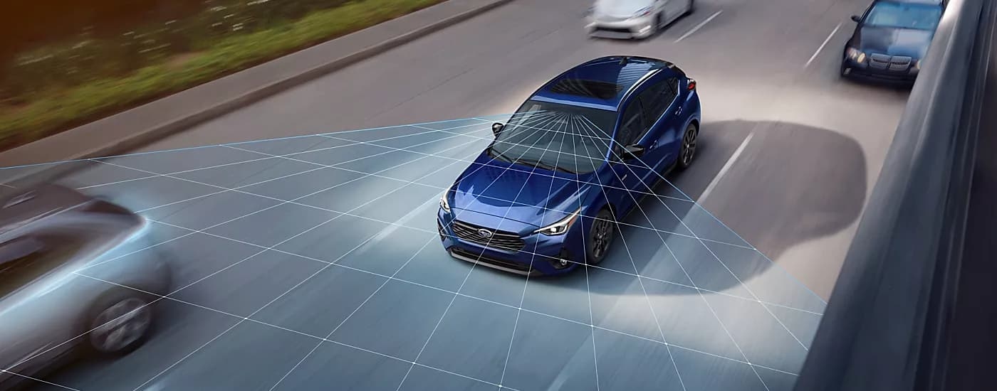 Simulated safety lines on a blue 2026 Subaru Impreza driving.