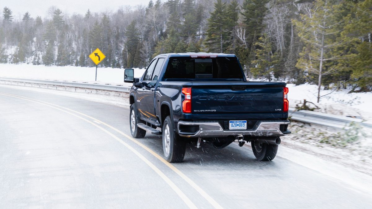 2020 Chevrolet Silverado 2500HD Exterior Driver Side Rear Angle in the Snow