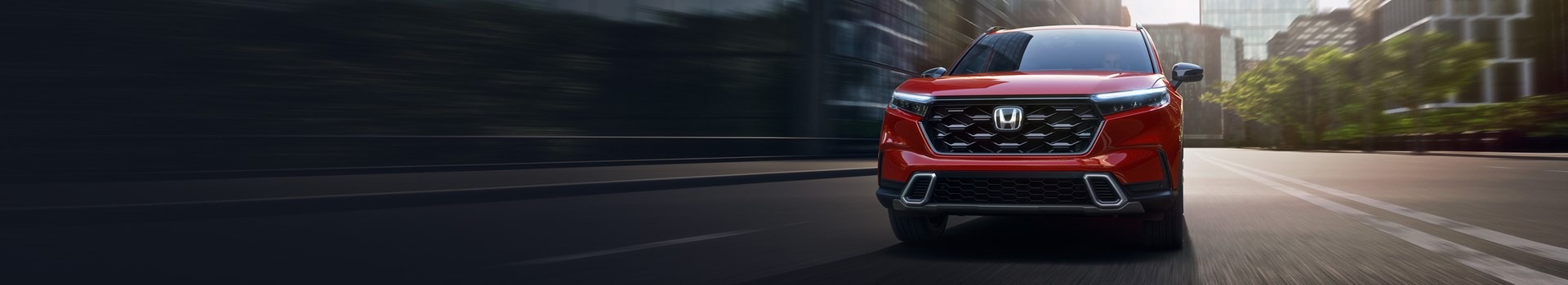 2025 Honda CR-V Hybrid Sport Touring in Radiant Red Metallic