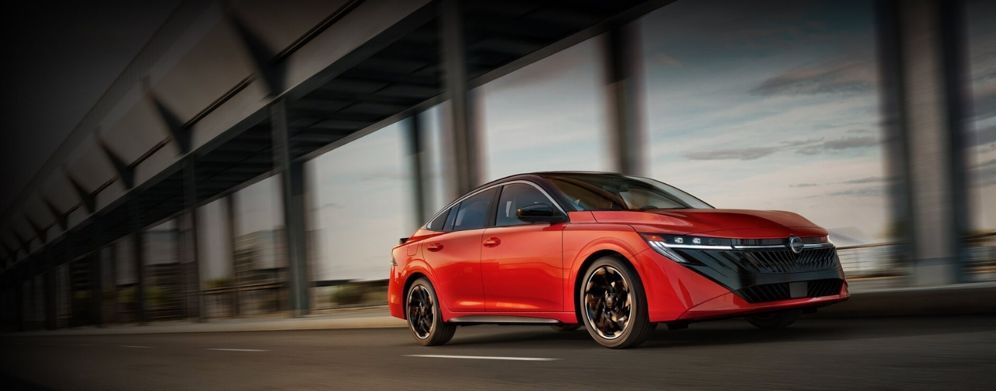 Orange 2026 Nissan Sentra SR driving on a highway