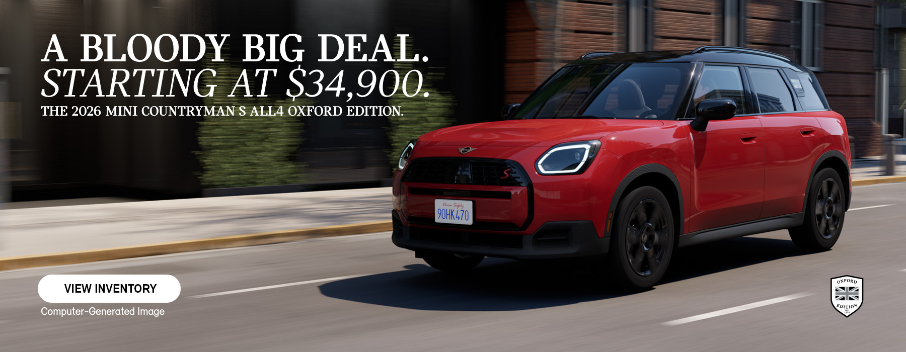 Red MINI Countryman Oxford driving down the road.