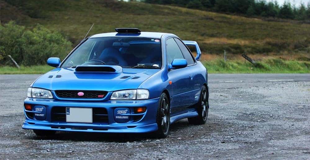 Classic blue Subaru Impreza WRX STI coupe