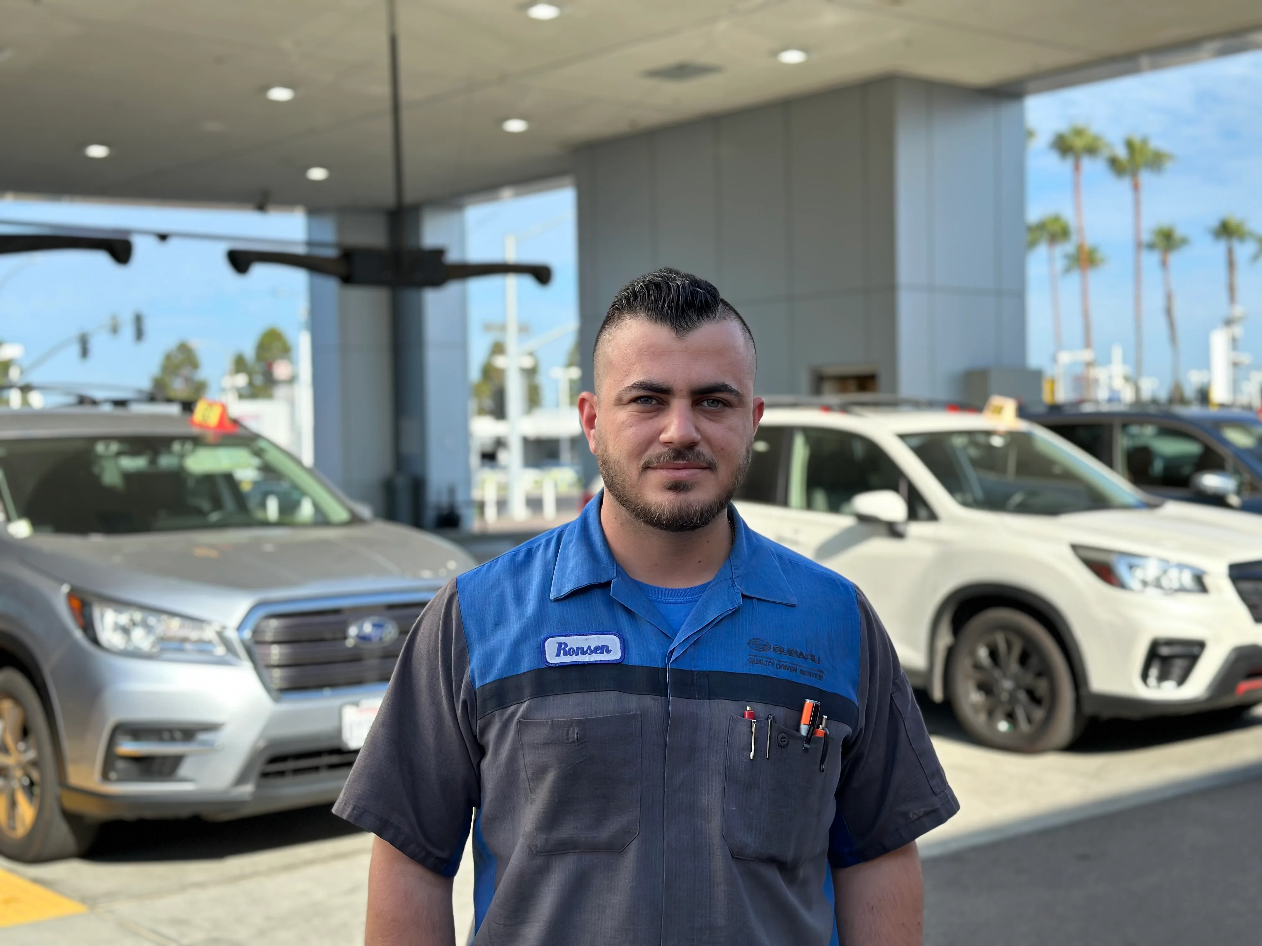 Dalton Subaru National City service technician standing in the service drive