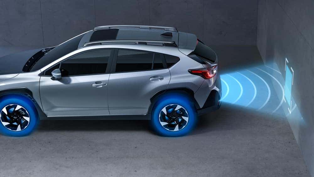 Gray 2024 Subaru Crosstrek with a graphic showing its safety sensors