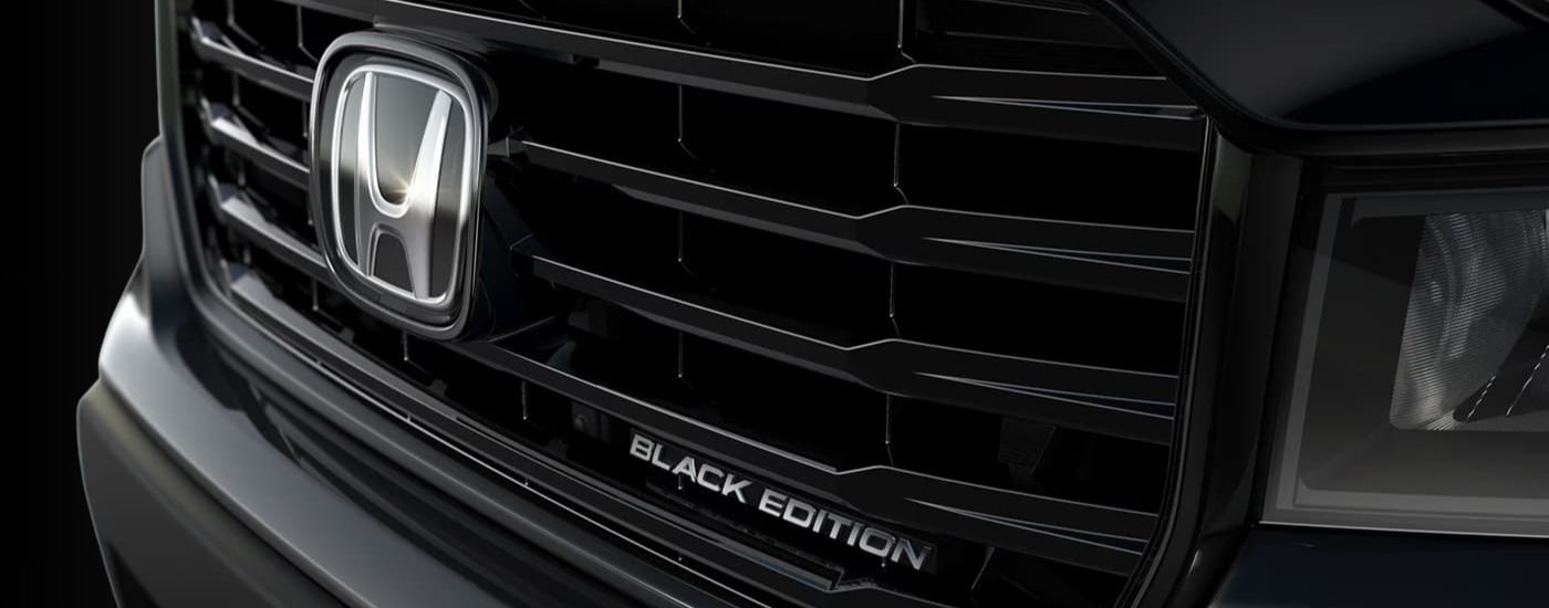 Badging and grille on a black 2021 Honda Ridgeline Black Edition
