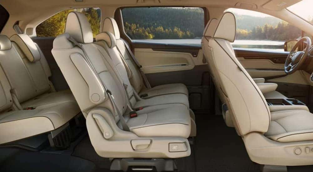 The tan interior of a 2024 Honda Odyssey Elite is shown.