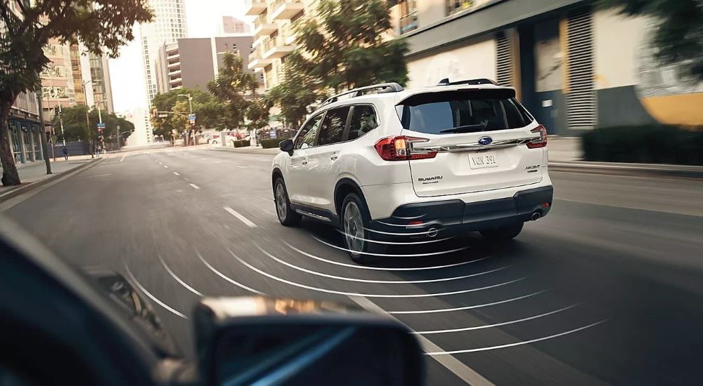 White 2024 Subaru Ascent using blind spot monitoring feature